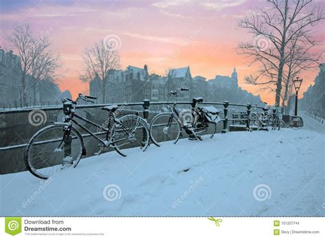 Sunset In Snowy Amsterdam In The Netherlands Stock Photo Image Of
