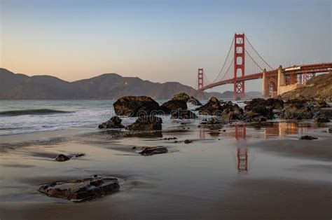 Golden Gate Bridge And Baker Beach Rocks At Sunset Stock Image Image