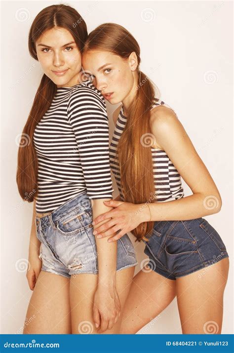 Two Cute Teenagers Having Fun Together On White Stock Image Image Of