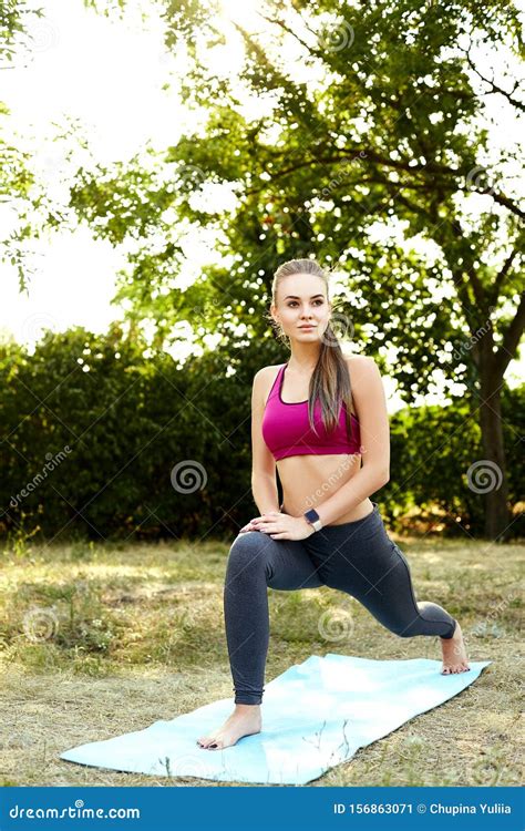 Blonde Girl Doing Exercises In The Park Stock Image Image Of Exercise