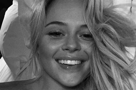 emily atack poses topless in bed after forgetting to…
