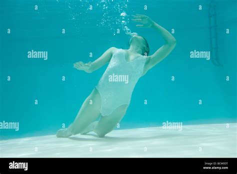 Teen Girl Underwater In Swimming Pool Stock Photo Royalty Free Image Alamy