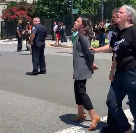 drama queen aoc pretends to be arrested as capitol police escort her away for blocking traffic