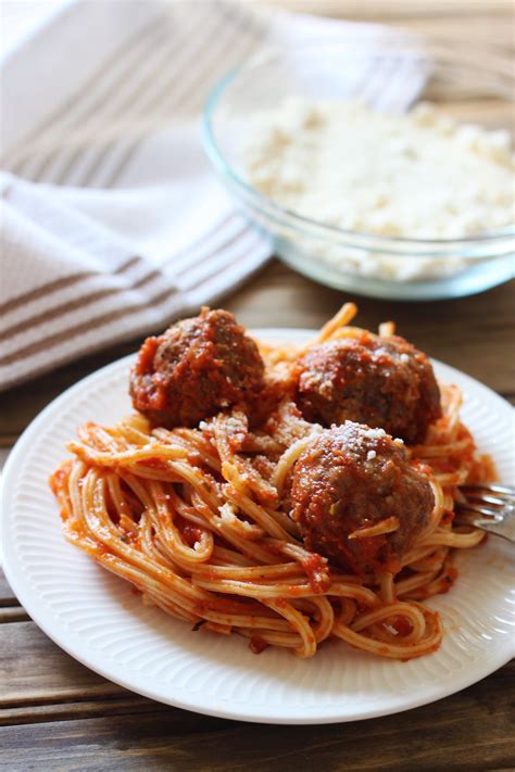 Top with the meatballs and marinara sauce and garnish with parsley and grated. Classic Spaghetti and Meatballs - The Tasty Bite