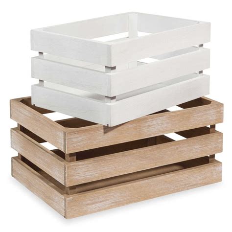 Three Wooden Crates Stacked On Top Of Each Other One White And The