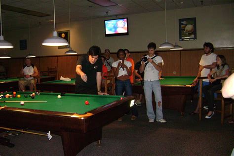Place the cue ball at one end of the table and arrange all 15 other balls from your chosen starting position (usually somewhere in front of it). How To Rack Pool Balls Tightly