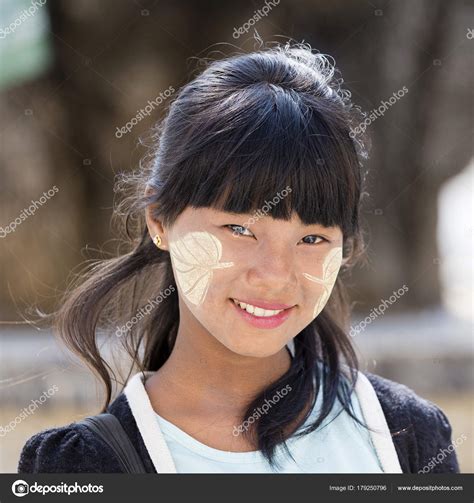 Portrait Young Girl With Thanaka On Her Smile Face Is Happiness