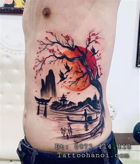 A Man With A Tattoo On His Stomach That Has An Image Of A Tree In The