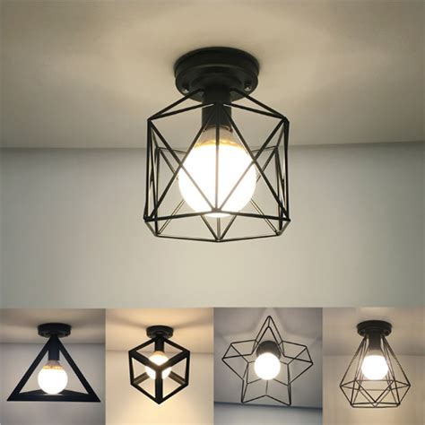 The most common round hanging light material is metal. Vintage Black Iron Ceiling Light Modern Industrial hanging ...