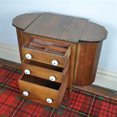 Early 20th Century Wooden Sewing Cabinet Ebth