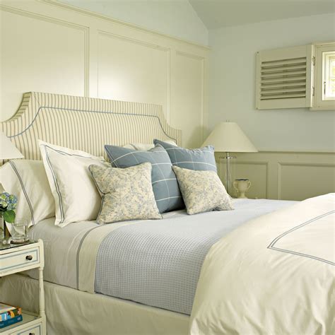 A Soft Blue And Cream Color Scheme Gives The Master Bedroom A Tranquil