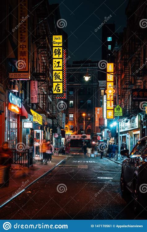 A Street With Colorful Signs At Night In Chinatown Manhattan New York