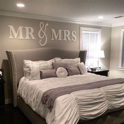 Go for a cozy look like the design above. Mr & Mrs Wall Sign Above Bed Decor - Mr and Mrs Sign for ...