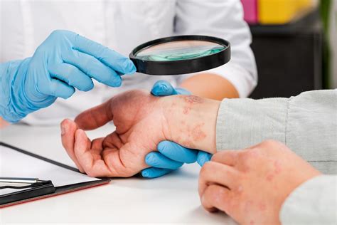 Premium Photo A Dermatologist Wearing Gloves Examines The Skin Of A