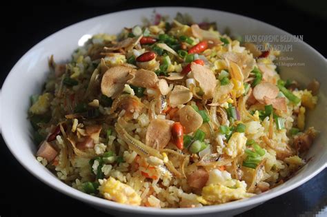 In a wok with some heated oil, the flavouring paste thus blended, is added and fried until aromatic. Nasi Goreng Belacan Pedas Berapi - AMIE'S LITTLE KITCHEN