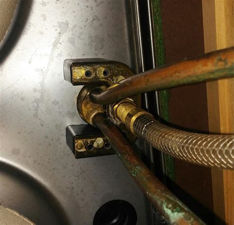 Remove kitchen faucet nut disconnect the hose to complete the job a socket wrench is mandatory. Faucet Removal Problem - Home Improvement Stack Exchange