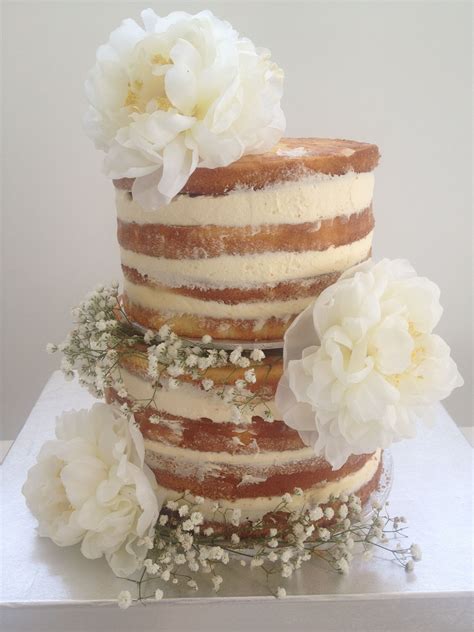 Naked Cake Decorated With Flowers And Baby S Breath Baby Birthday Birthday Cake Baby S Breath