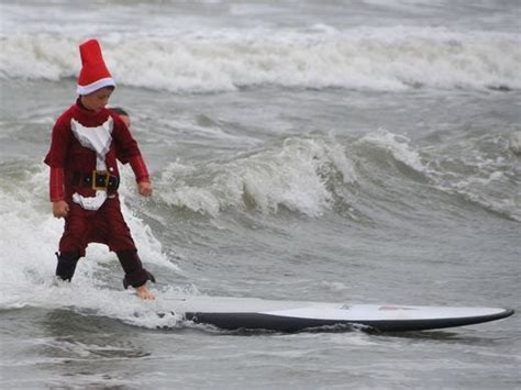 Ho Ho Hang Ten Surfin Santas Catching A Worldly Wave