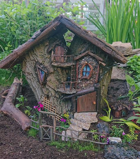 Solar winding tree fairy house green, mini fairy house, mini tree house —. I just finished another log fairy house. I just need a few ...