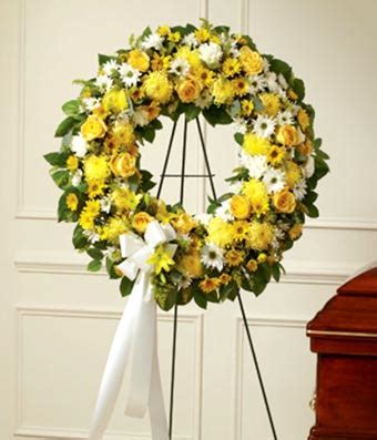 Proflowers understands how hard it is to experience the loss of a loved one. Yellow & White Flower Standing Wreath at From You Flowers