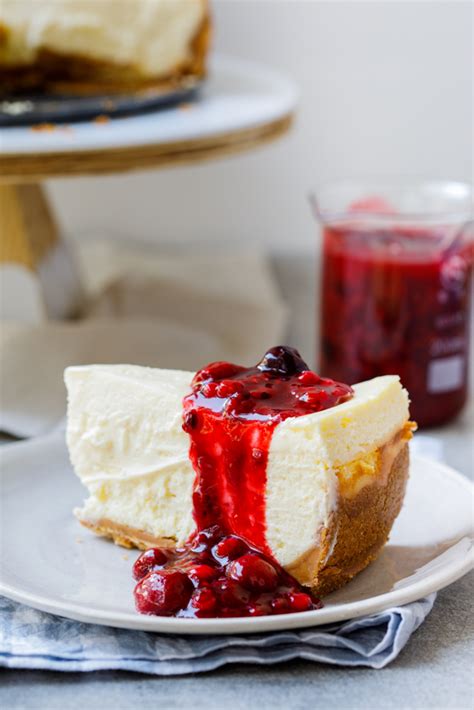 Add granulated sugar and beat for another 2 minutes. Classic baked cheesecake with easy berry sauce - Simply ...