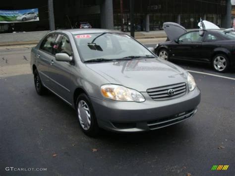 Your 2003 toyota corolla is painted at the factory with a high quality basecoat/clearcoat system. 2003 Mineral Green Metallic Toyota Corolla LE #22126027 Photo #6 | GTCarLot.com - Car Color ...