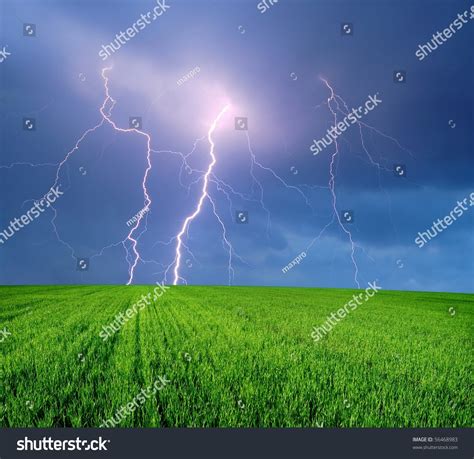 Thunderstorm With Lightning In Green Field Stock Photo 56468983