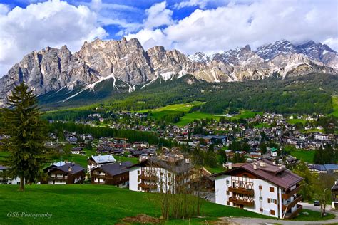 Situated on the boite river, in an alpine valley, it is a winter sport resort known for its skiing trails, scenery, accommodation. Cortina d'Ampezzo with Pomagagnon Mountains, Dolomites, It ...