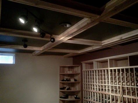 I installed faux wood ceiling beams and put faux shiplap planks over my popcorn ceiling as part of my living room makeover. Hand Crafted Wine Cellar Box Beam Ceiling by P.T. Walz ...