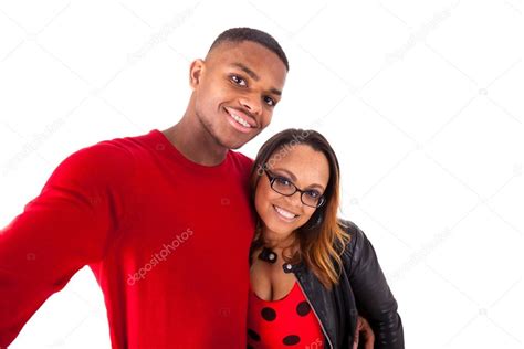 Happy Mixed Race Couple Hugging Over A White Background Stock Photo By