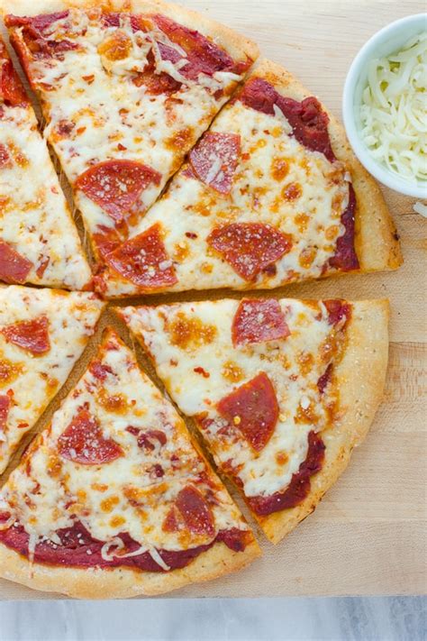 Brush your cooked pizza crust generously with this mixture (it will act as a base sauce for your pizza and also flavor the crust and help it crisp up while cooking!) The Best Gluten-Free Pizza Crust - Meaningful Eats