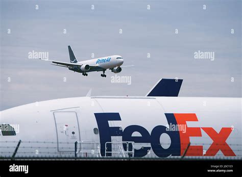 Amazon Prime Air Cargo Jet Landing Above Fedex Airplane At Allentown