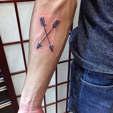 Watercolor tattoos are becoming extremely popular and combining it with arrows is a great equation. 40 Simple Arrow Tattoo Designs For Men - Sharp Ink Ideas