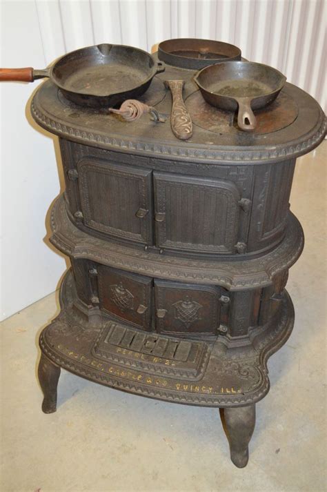 Please, don't do things that will make the government go after regular fireplaces or wood stoves. RARE ANTIQUE ORNATE CAST IRON WOOD BURNING PARLOR STOVE ...