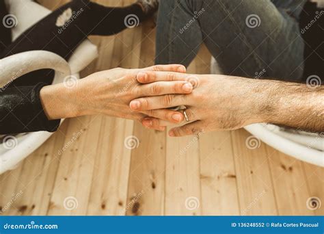 Close Up Of Two Hands Fondly Joined Together Concept Of Love Between