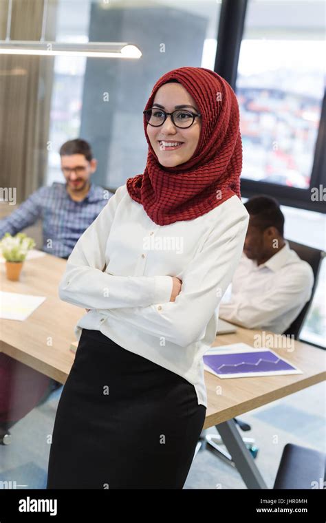 Arabian Businesswoman In Office With Businesspeople Meeting In The