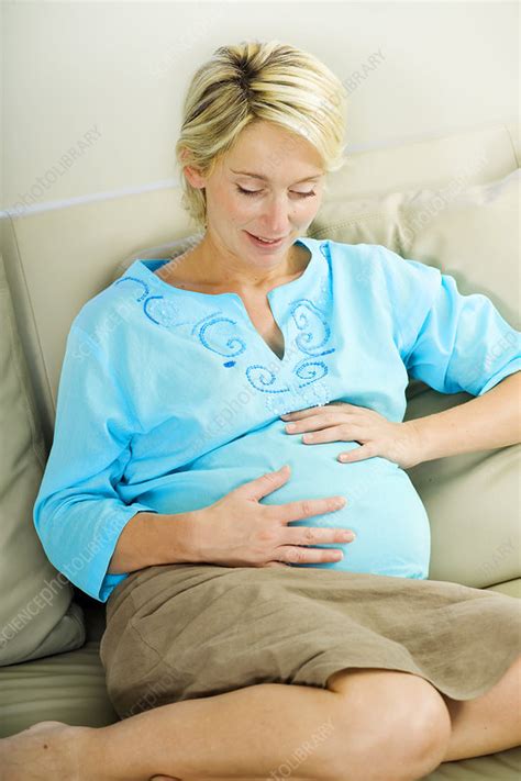 Pregnant Woman Indoors Stock Image C Science Photo Library