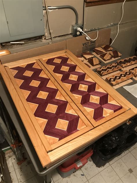 One coat primer is enough to satisfy the primer's need in most cases. Second coat of polyurethane on the cherry and Purple Heart ...