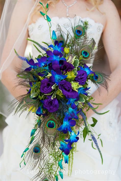 Peacock feathers were a very predominant feature in weddings and celebrations during the victorian era. Flowers by Tami McAllister in Chattanooga | Peacock ...
