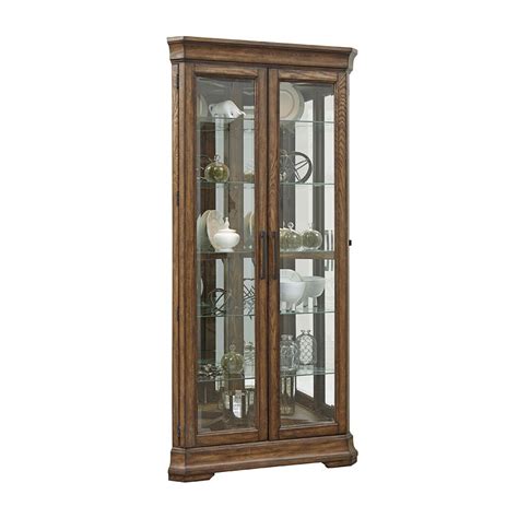 Sei, corner lighted mahogany curio cabinet, display your collectables with pride in this lighted curio cabinet. Lighted 5 Shelf Double Door Corner Curio Cabinet by ...