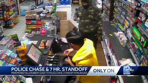 Video Shows Suspect Robbing Store Clerk Stealing Car Crashing After Chase