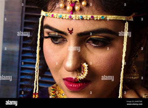 Beautiful Indian Marathi Bride In Traditional Nauvari Saree And Jewelry