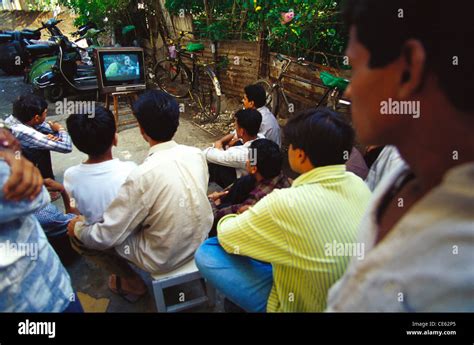 Crowd Of People Building Residents Anxiously Watching World Cup Cricket