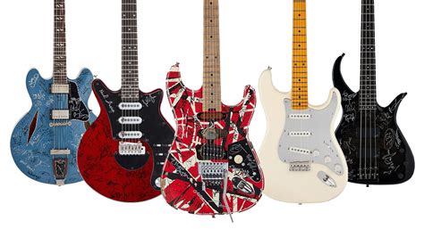 Guitars Signed By Dave Grohl Nile Rodgers Brian Johnson John Paul