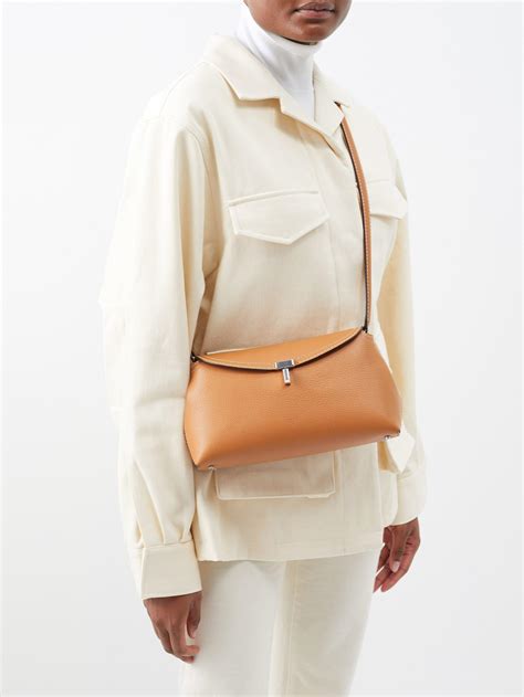 Totême T Lock Small Grained Leather Cross Body Bag In White Lyst Canada