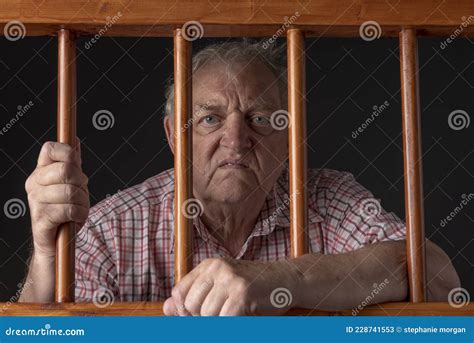 Mature White Man Behind Bars With Angry Facial Expression Stock Image Image Of Expression