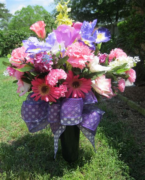 Plus, artificial flowers are extremely low maintenance, require no watering and are great for those with allergies. Cemetery Silk Flowers Arrangement
