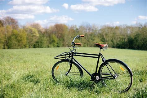 Bicycle On The Field By Stocksy Contributor Highlander Stocksy
