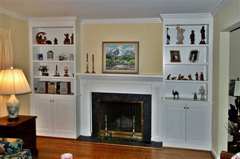 Let these ideas help you to shape your vision for your own. fireplace surrounds with bookcases | Two fireplaces that ...
