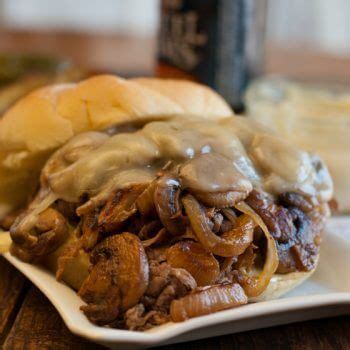 This recipe combines tender shaved steak, melted provolone cheese, caramelized onions, mushrooms sautéed in bourbon, and our roasted garlic aioli into one amazingly good steak bomb sandwich. Steak Bomb Sandwich | Recipe (With images) | Shaved beef recipe